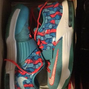 Orange and blue Nike 5